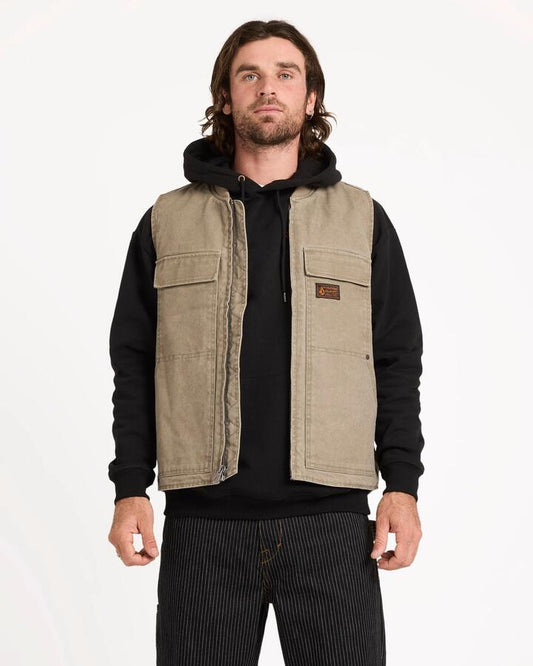 Image of a model wearing Uniforms & Workwear. Product name - Volcom Mens Freshdust Workwear Vest Brindle in Brindle colour by brand - Volcom
