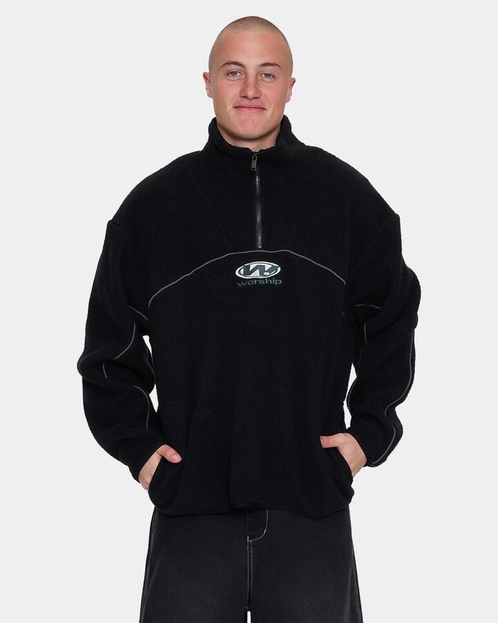 Image of a model wearing Outerwear. Product name - Worship Mens Sonic Quarter Zip Sherpa Fleece Jumper Black in Black colour by brand - Worship