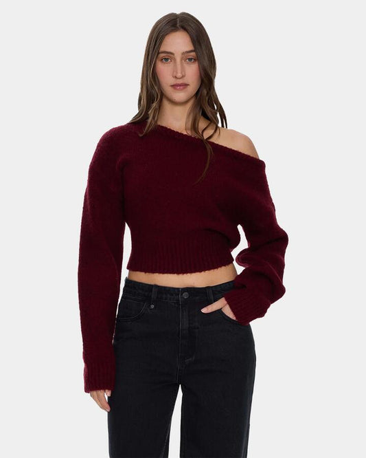 Image of a model wearing Outerwear. Product name - Thrills Womens Oslo Cold Shoulder Knit Sweater New Maroon in New Maroon colour by brand - Thrills
