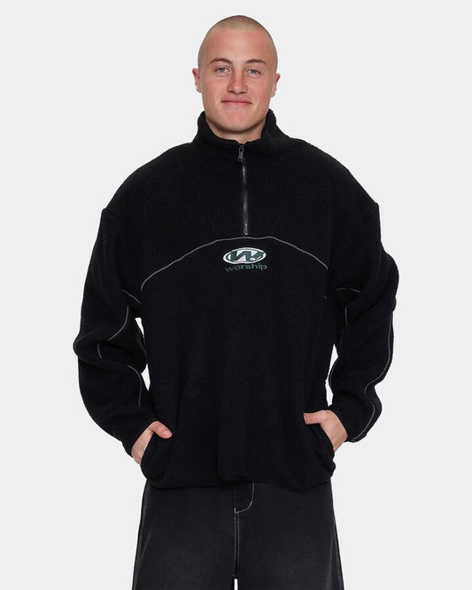 Image of a model wearing Outerwear. Product name - Worship Mens Sonic Quarter Zip Sherpa Fleece Jumper Black in Black colour by brand - Worship