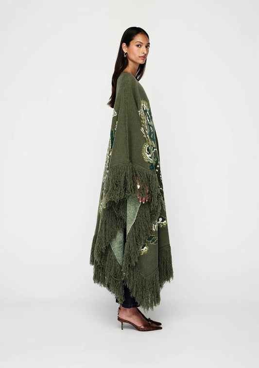Image of a model wearing Outerwear. Productname: Sylva Jacquard Poncho | MOS The Label in Sylva Print colour by brand - MOS The Label