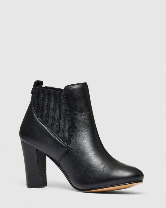 Image of Boots. Product name - Touche Black Smooth Boots in Black colour by brand - Novo