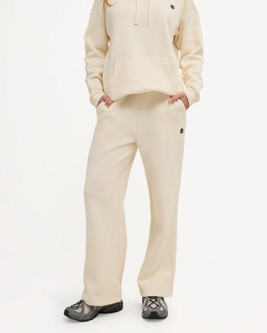 Image of a model wearing Pants. Product name - Element Womens Cornette Wide Trackpants Off White in Off White colour by brand - Element
