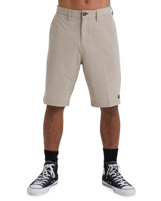 Image of a model wearing Shorts. Product name - Billabong Mens Crossfire Walkshorts Khaki in Khaki colour by brand - Billabong