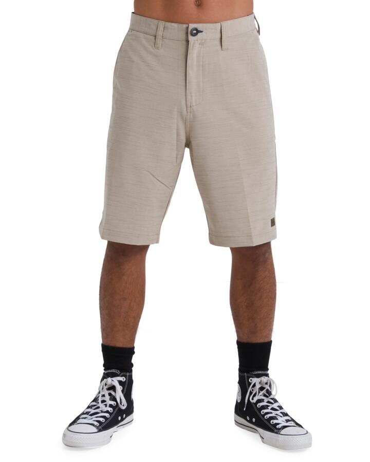 Image of a model wearing Shorts. Product name - Billabong Mens Crossfire Walkshorts Khaki in Khaki colour by brand - Billabong