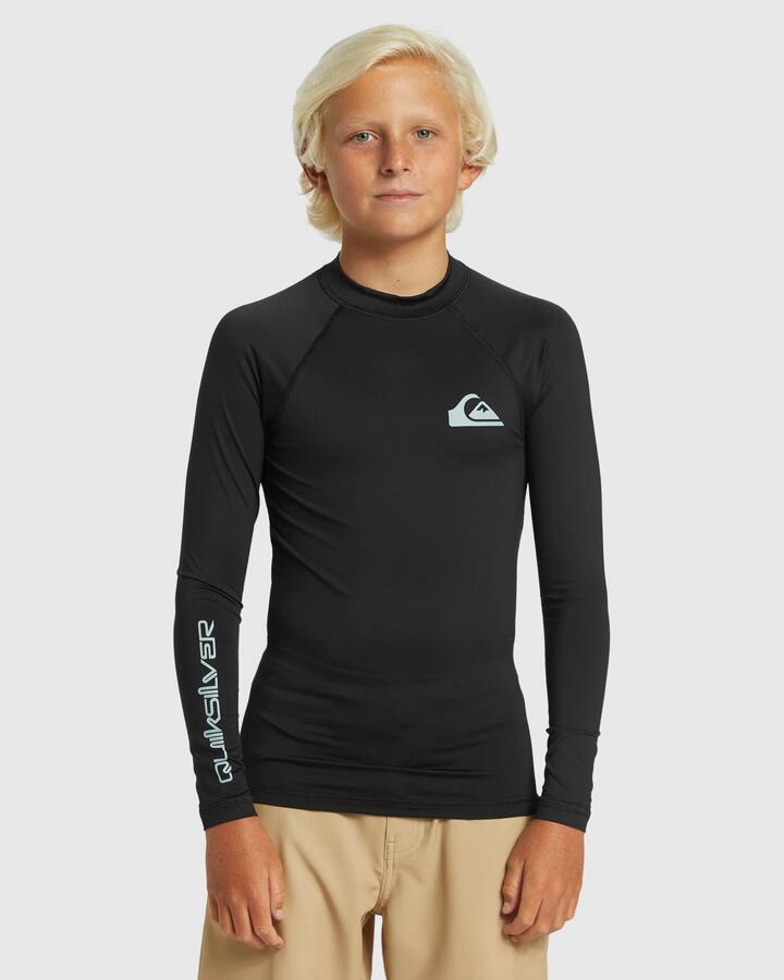 Image of a model wearing Tops. Product name - Quiksilver Boys 8-16 Everyday Solid Long Sleeve Upf 50 Rash Vest Black in Black colour by brand - Quiksilver