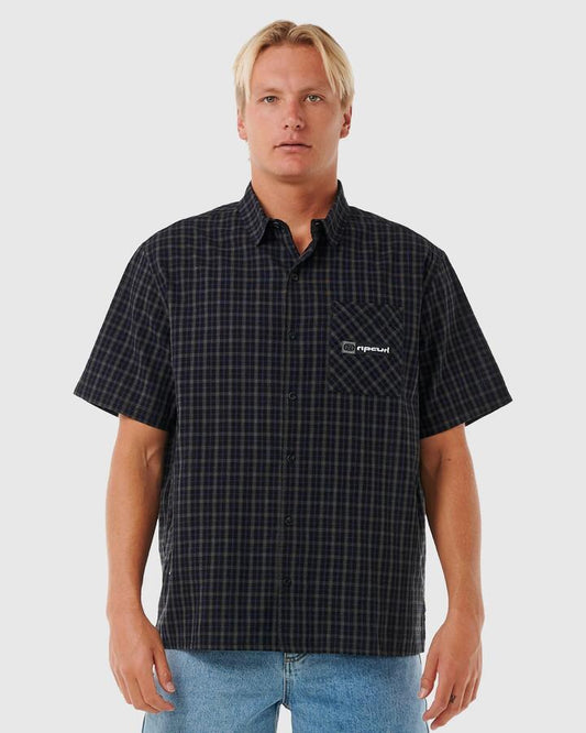 Image of a model wearing Tops. Product name - Rip Curl Mens Super Computer Short Sleeve Shirt Black in Black colour by brand - Rip Curl
