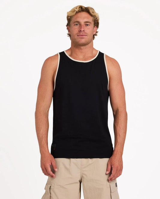 Image of a model wearing Tops. Product name - Billabong Mens Strike Mission Tank Top Black in Black colour by brand - Billabong