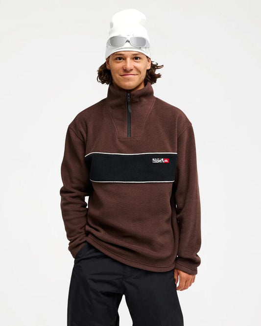 Image of a model wearing Outerwear. Product name - Quiksilver Mens Yg Cruz Polar Half Zip Fleece Java in Java colour by brand - Quiksilver