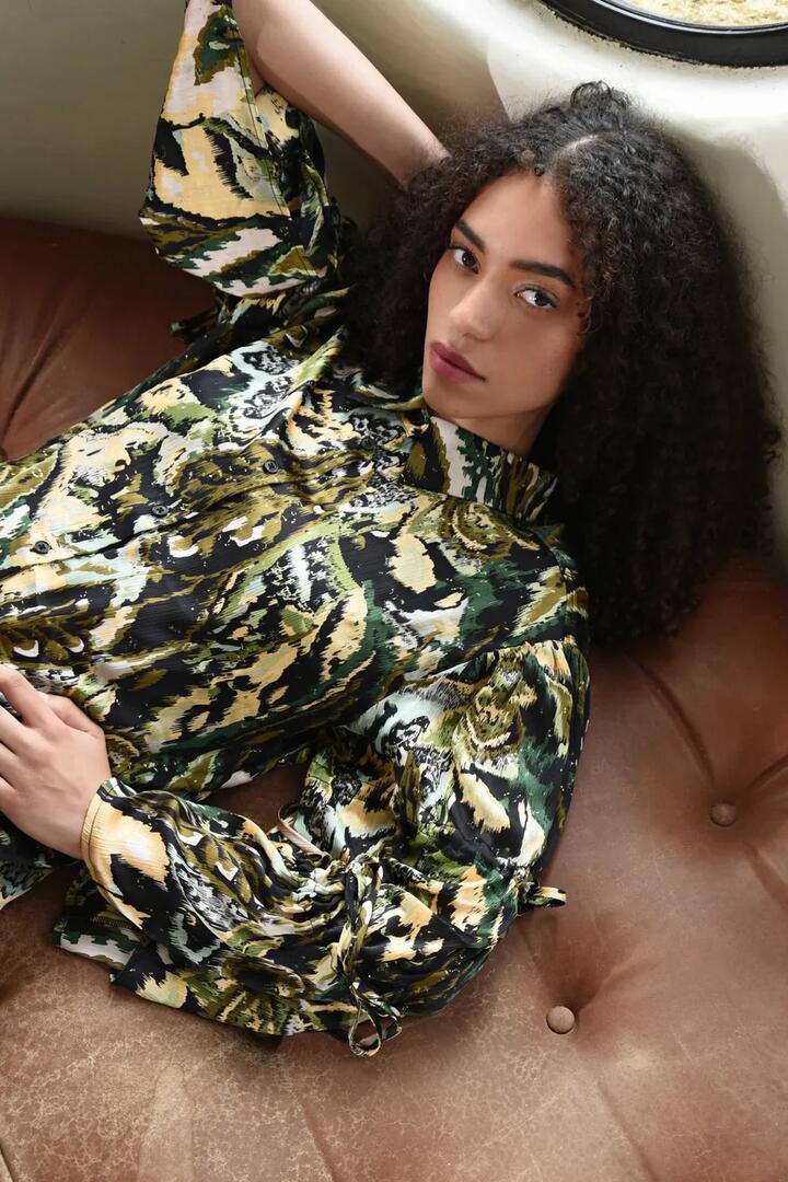 Image of a model wearing Tops. Product name - Sleeve It To Me Khaki Print Tie Detail LS Top in Khaki colour by brand - Coop