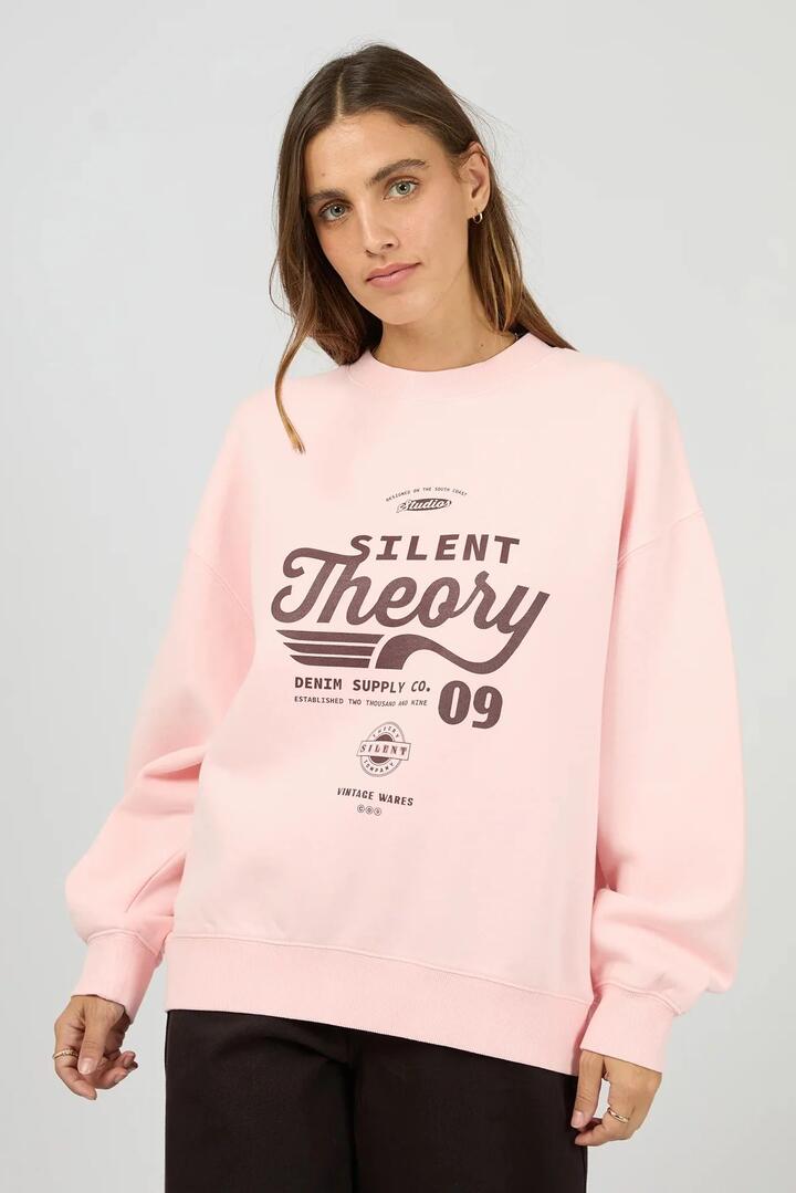 Image of a model wearing Outerwear. Product name - Emblem Pink Brushed Fleece Crew in Pink colour by brand - Silent Theory
