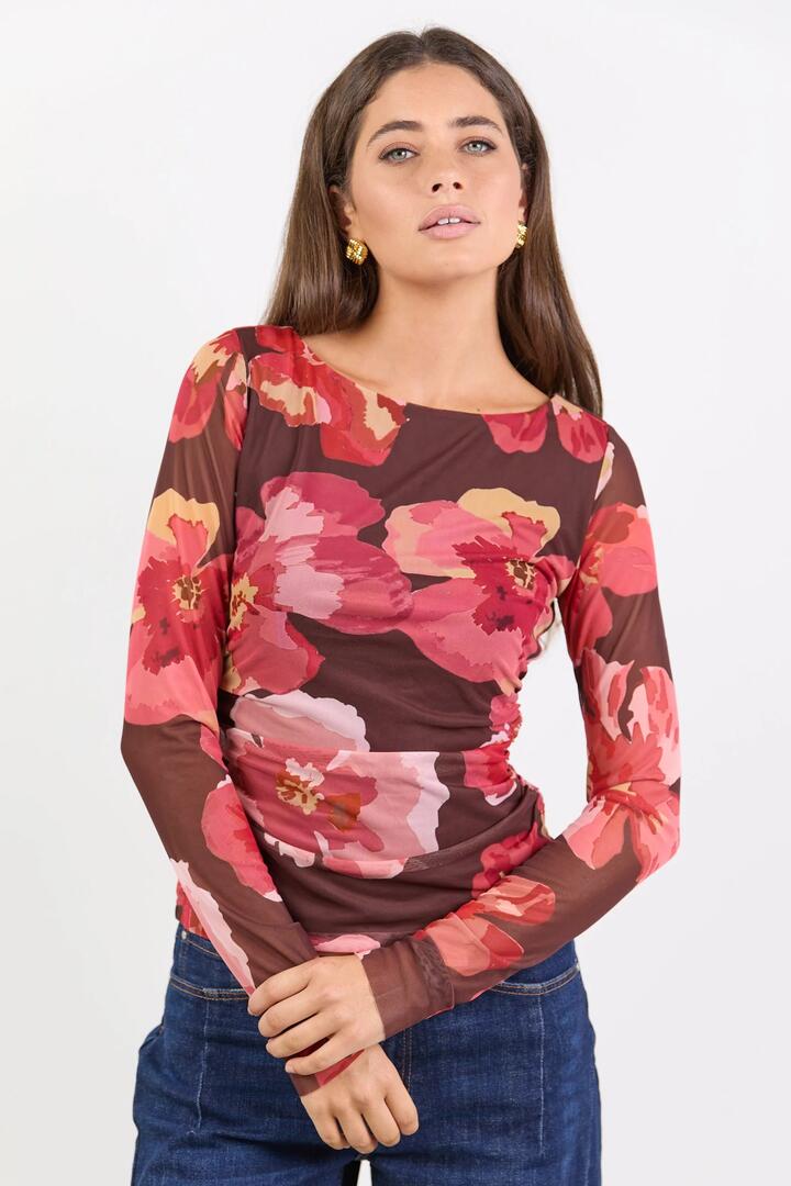 Image of a model wearing Tops. Product name - Magnitude Chocolate Red Floral Mesh Long Sleeve Mesh Top in Chocolate Red Floral Mesh colour by brand - Among the Brave