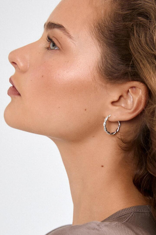 Image of Jewelry. Product name - Naja Pi Silver Twisted Small Hoop Earrings in Silver colour by brand - Pilgrim