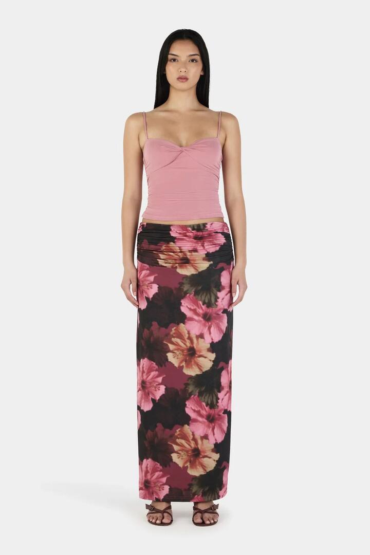 Image of a model wearing Skirts. Product name - Alba Winter Hibiscus Maxi Skirt in Multi colour by brand - Ownley