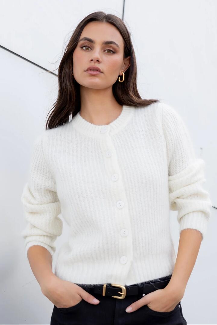 Image of a model wearing Outerwear. Product name - Highlight Ivory Mohair Blend Crewneck Cardigan in Ivory colour by brand - Ivy + Jack