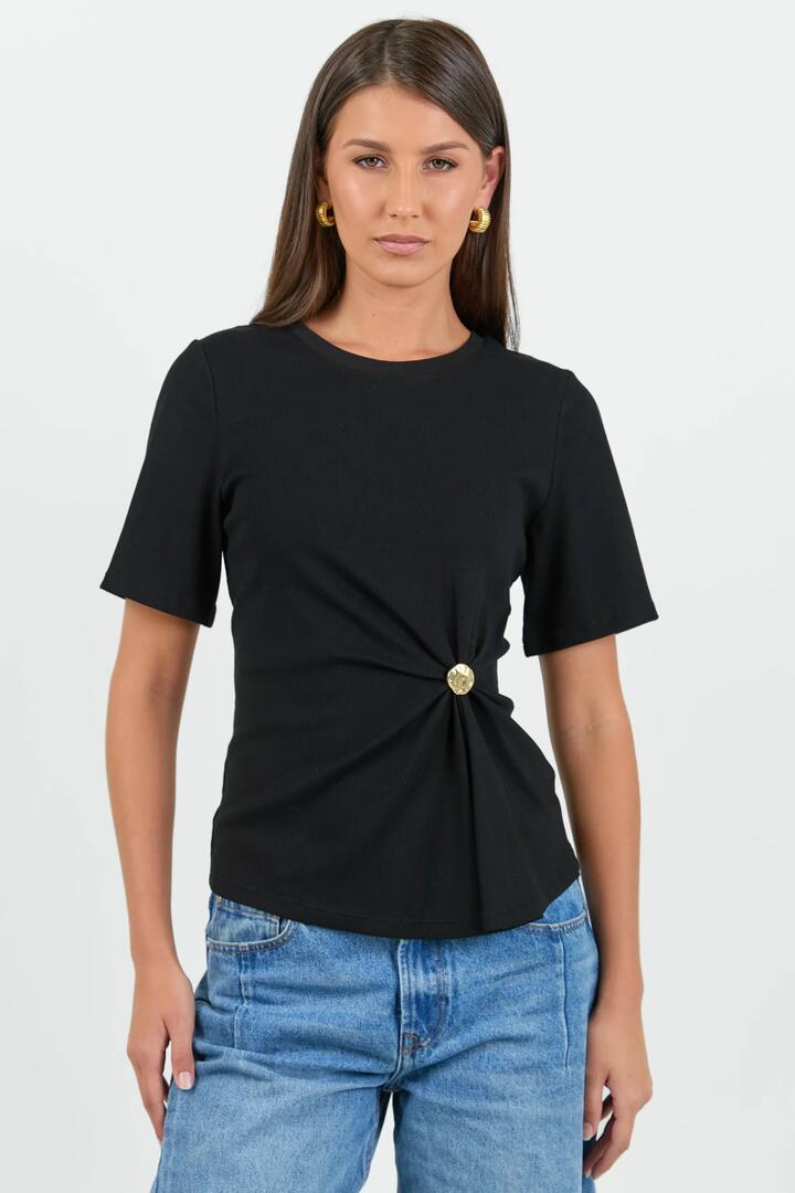 Image of a model wearing Tops. Product name - Helm Black Waist Buckle Short Sleeve Tee in Black colour by brand - Stories be Told