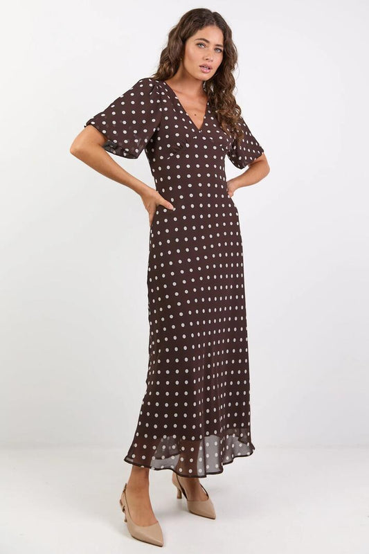 Image of Dresses. Product name - Aura Chocolate Polka Dot Puff Short Sleeve Bias Midi Dress in Chocolate Polka Dot colour by brand - Among the Brave