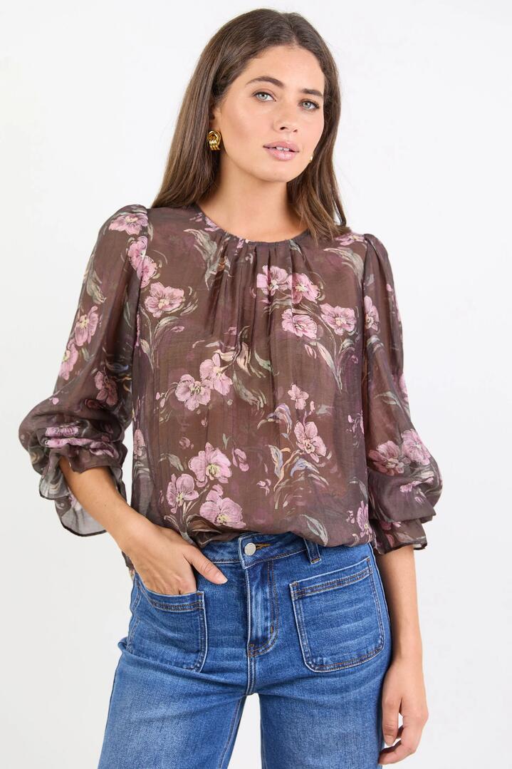 Image of a model wearing Tops. Product name - Endless Chocolate Floral Blouson Sleeve LS Top in Chocolate Floral colour by brand - By Rosa.