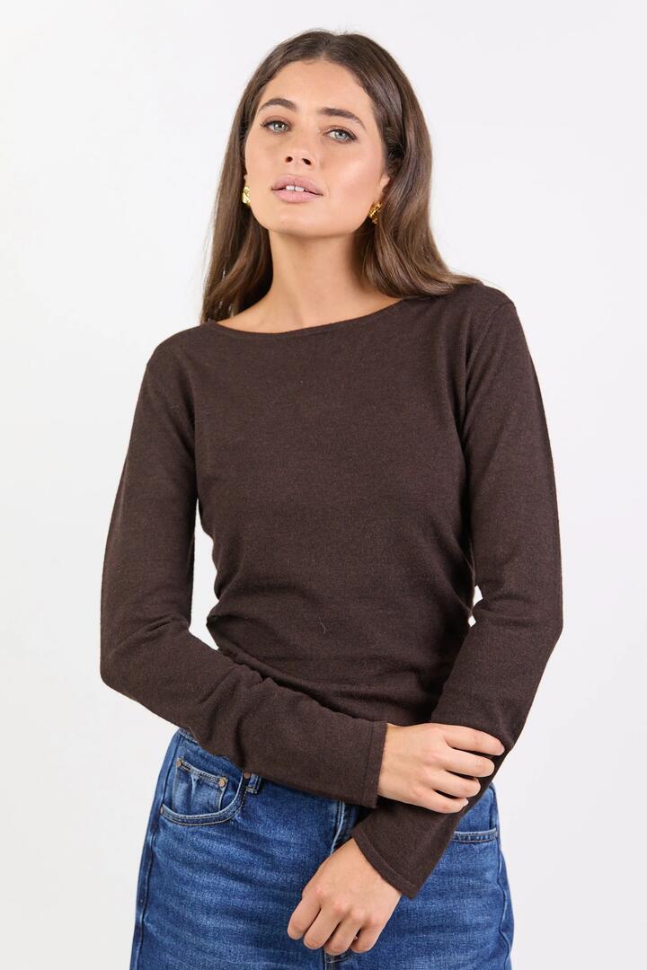 Image of a model wearing Outerwear. Product name - Groove Chocolate Ruched Side Long Sleeve Knit Top in Chocolate colour by brand - Among the Brave