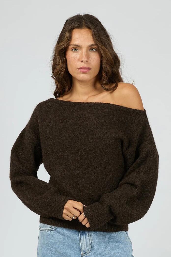 Image of a model wearing Outerwear. Product name - Off Shoulder Chocolate Knit Jumper in Brown colour by brand - Silent Theory