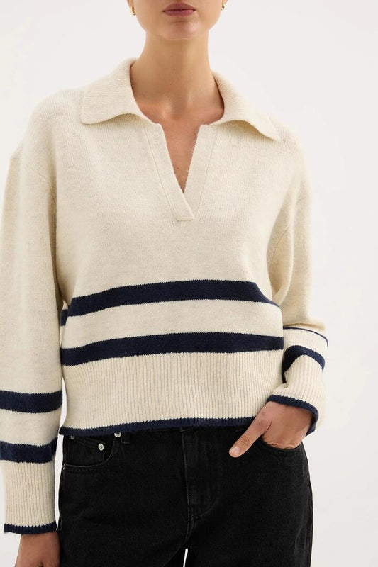 Image of a model wearing Outerwear. Product name - Archer Cream Stripe Collared Rugby Knit in Cream colour by brand - Nude Lucy