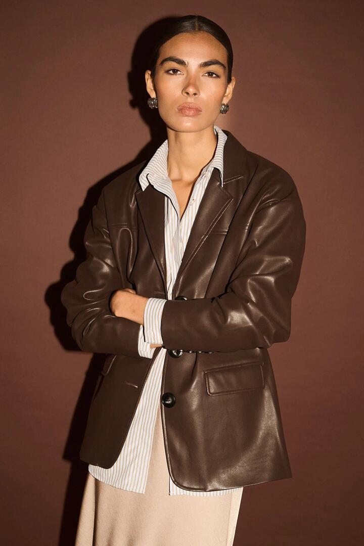 Image of Coats & Jackets. Product name - Freja Chocolate Vegan Leather Jacket in Brown colour by brand - Staple The Label