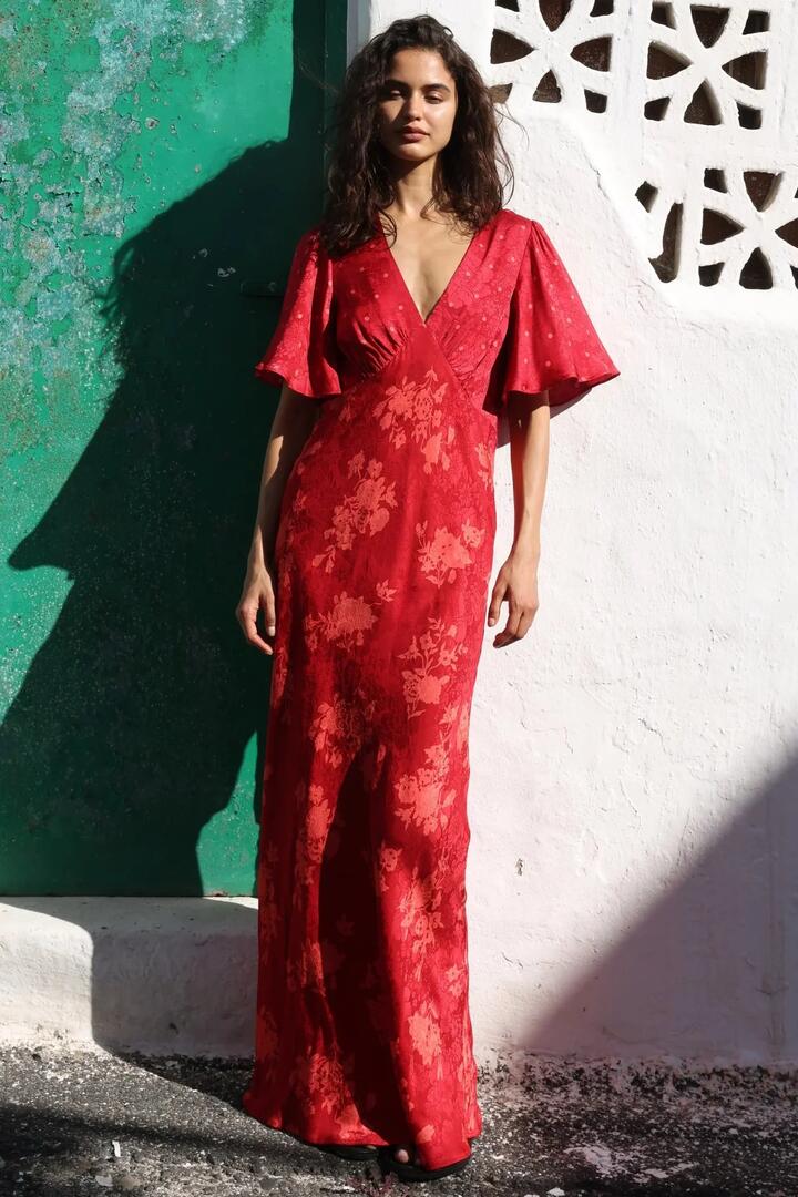 Image of Dresses. Product name - Rhea Red Floral V Neck Flutter Sleeve Maxi Dress in Red colour by brand - Auguste The Label
