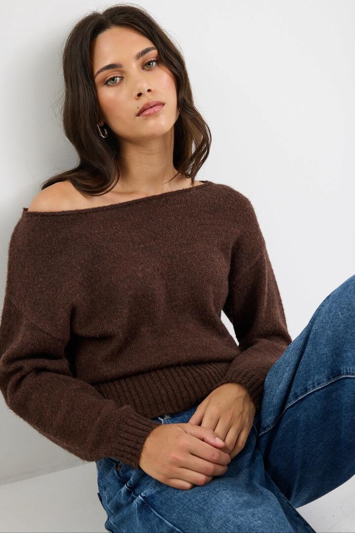 Image of a model wearing Outerwear. Product name - Society Chocolate Off Shoulder Jumper in Chocolate colour by brand - By Rosa.