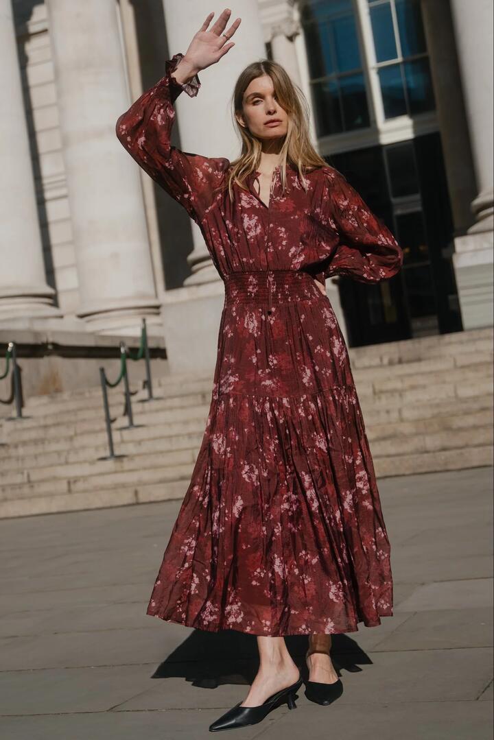 Image of Dresses. Product name - Addition Plum Smudge Floral Long Sleeve Shirred Waist Tiered Maxi Dress in Plum Smudge Floral colour by brand - Ivy + Jack