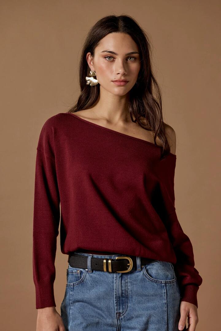 Image of a model wearing Outerwear. Product name - Incentive Burgundy Plum Boatneck Jumper in Burgundy Plum colour by brand - Ivy + Jack