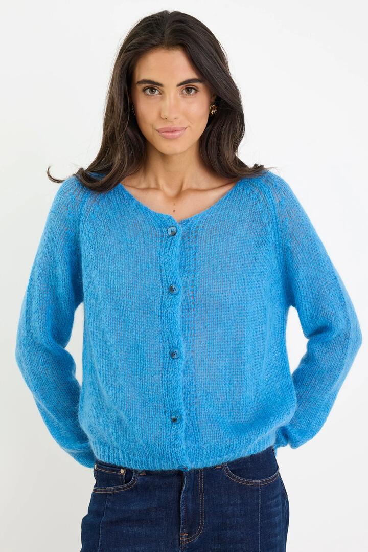 Image of a model wearing Outerwear. Product name - Emmy Cobalt Blue Mohair Cardigan in Blue colour by brand - Humidity Lifestyle
