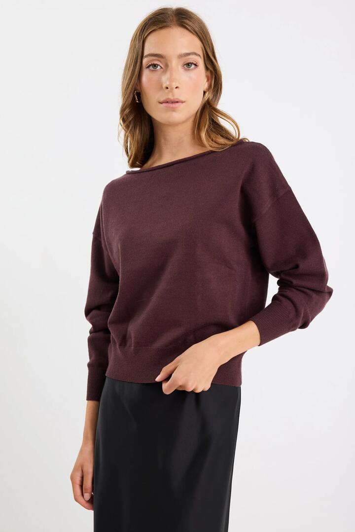 Image of a model wearing Outerwear. Product name - Incentive Chocolate Boatneck Off Shoulder Jumper in Chocolate colour by brand - Ivy + Jack