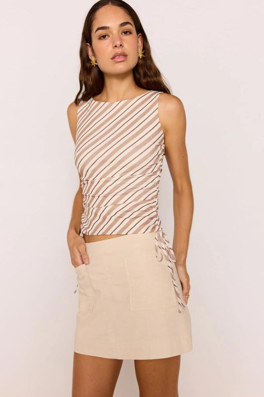 Image of a model wearing Tops. Product name - Orielle Brown Cream Stripe Mesh Sleeveless Top in Neutral Stripe colour by brand - Mink Pink