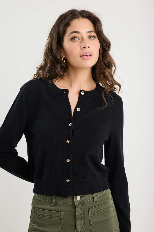 Image of a model wearing Outerwear. Product name - Replica Black Cotton Cashmere Crewneck Cardigan in Black colour by brand - Among the Brave