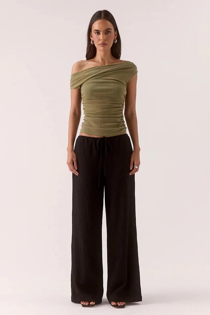 Image of a model wearing Tops. Product name - Zeya Soft Khaki Sparkle Mesh Off Shoulder Top in Khaki colour by brand - Sovere