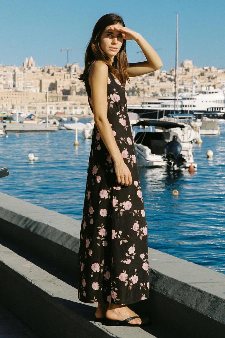 Image of Dresses. Product name - River Black Floral Sleeveless Maxi Dress in Black colour by brand - Auguste The Label