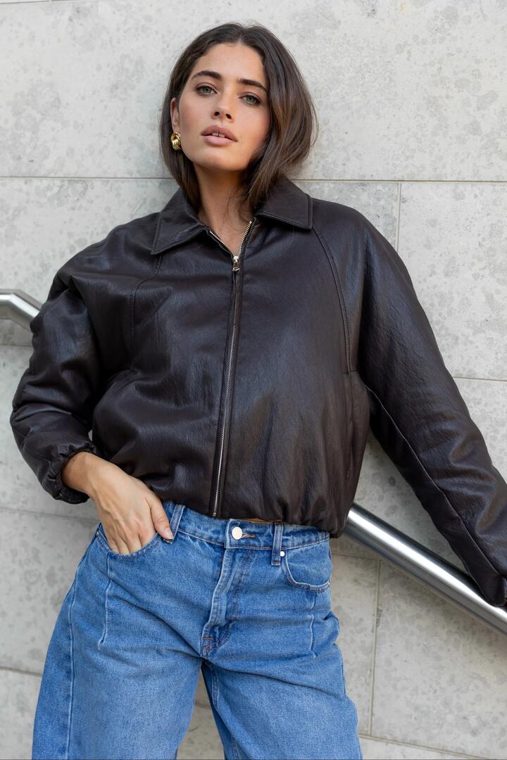 Image of Coats & Jackets. Product name - Troupe Chocolate PU Leather Zip Through Bubble Hem Bomber Jacket in Chocolate colour by brand - Stories be Told