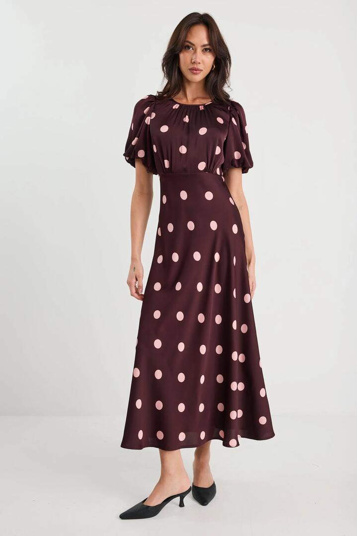 Image of Dresses. Product name - Stage Plum Polka Dot Puff Sleeve Satin Floaty Maxi Dress in Plum Polka Dot colour by brand - Stories be Told