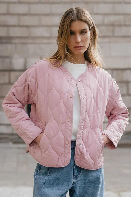 Image of Coats & Jackets. Product name - Apex Blush Collarless Quilted Puffer Jacket in Blush colour by brand - Stories be Told