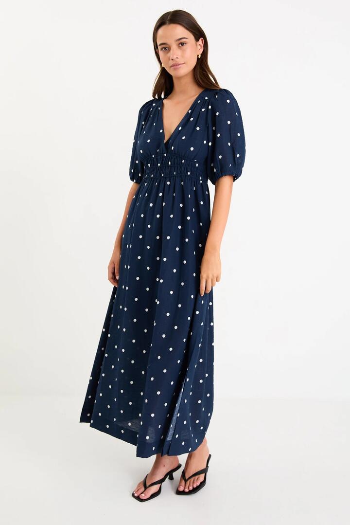 Image of Dresses. Product name - Eloquent Navy Polka Dot Puff Sleeve Maxi Dress in Navy Polka Dot colour by brand - Stories be Told