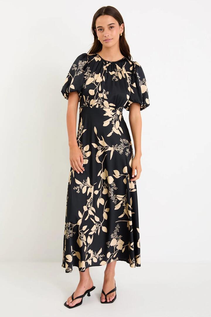 Image of Dresses. Product name - Stage Black Beige Floral Satin Puff Sleeve Floaty Maxi Dress in Black Beige Floral colour by brand - Stories be Told