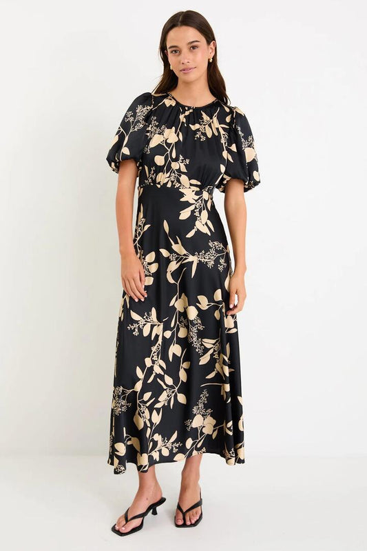 Image of Dresses. Product name - Stage Black Beige Floral Satin Puff Sleeve Floaty Maxi Dress in Black Beige Floral colour by brand - Stories be Told