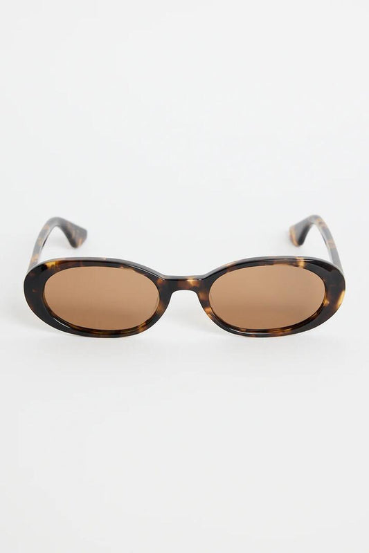 Image of Sunglasses. Product name - Sydney Tort Narrow Oval Sunglasses in colour by brand - RE:UNION Label