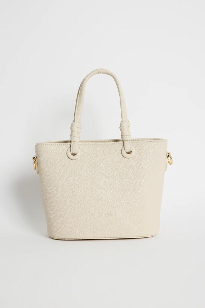 Image of Bags. Product name - Siena Beige PU Leather Small Knot Top Handle Bag in Beige colour by brand - Among the Brave