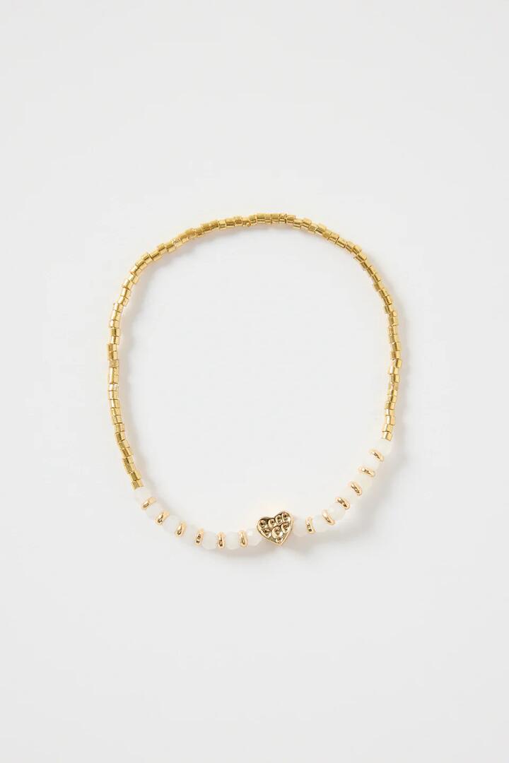 Image of Jewelry. Product name - Ivory Gold Beaded Heart Charm Bracelet in Gold colour by brand - Humble + Heart