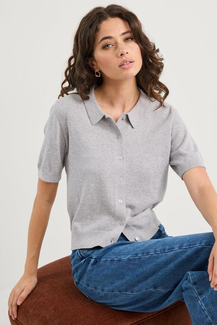 Image of a model wearing Outerwear. Product name - Agency Grey Marle Short Sleeve Knit Polo Cardigan in Grey Marle colour by brand - Among the Brave
