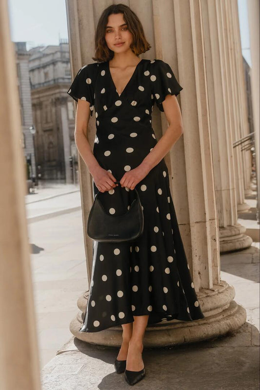 Image of Dresses. Product name - Chariot Black Polka Dot Bias Flutter Sleeve Maxi Dress in Black Polka Dot colour by brand - Among the Brave