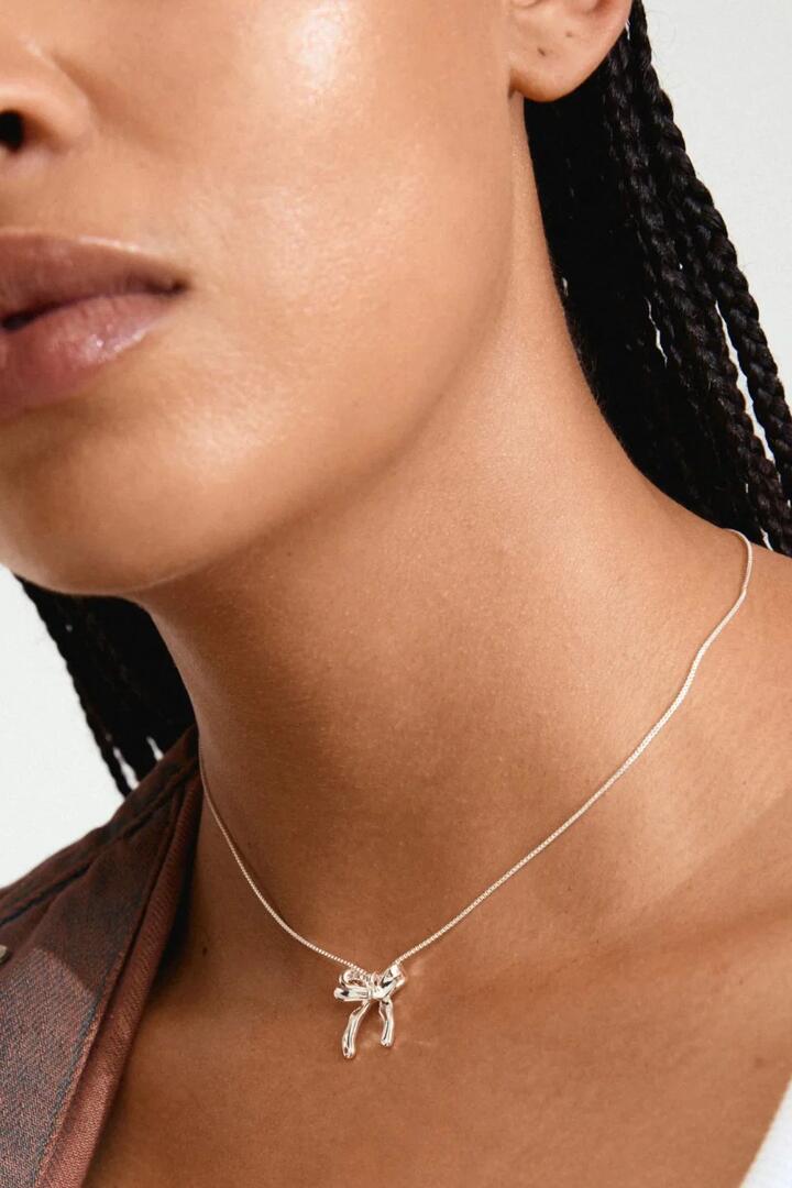 Image of Jewelry. Product name - Cassian Recycled Silver Plated Bow Necklace in Silver colour by brand - Pilgrim