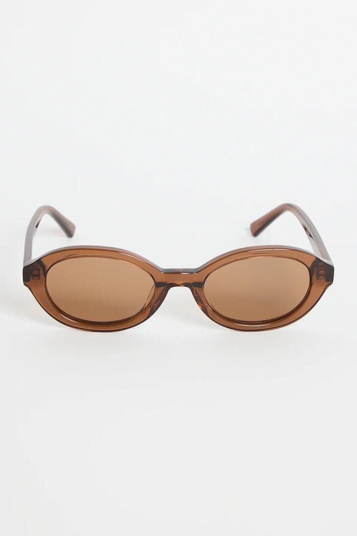 Image of Sunglasses. Product name - Vienna Espresso Oval Sunglasses in colour by brand - RE:UNION Label