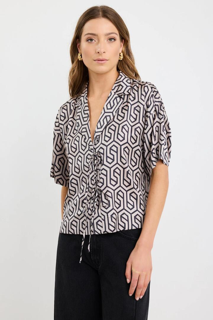 Image of Shirts. Product name - Fasten Black Geo Print Satin Tie Front Shirt in Black Geo Print colour by brand - Stories be Told